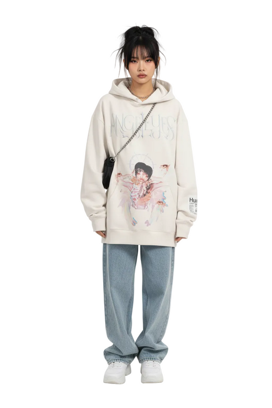 Beige hoodie with angel graphic and 'Angeles' text on a white background