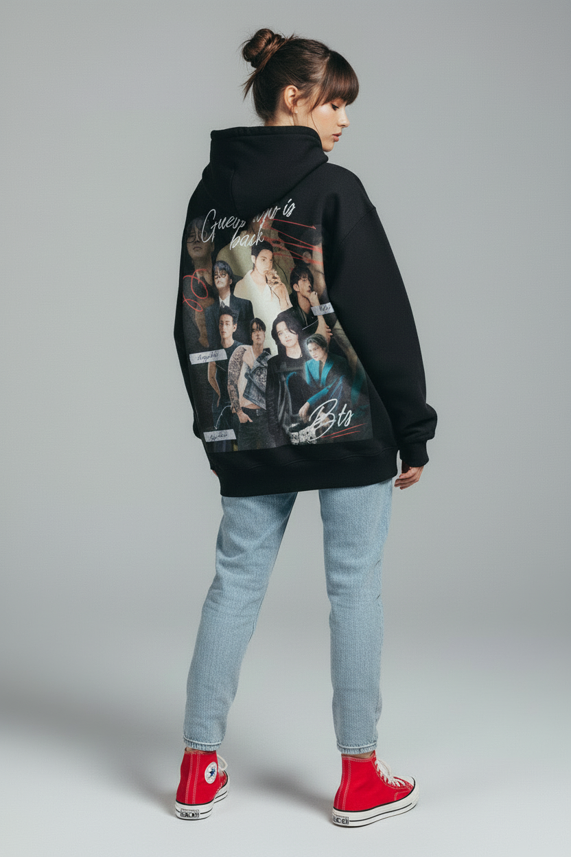 Black hoodie with a graphic design on the back featuring multiple people and text.