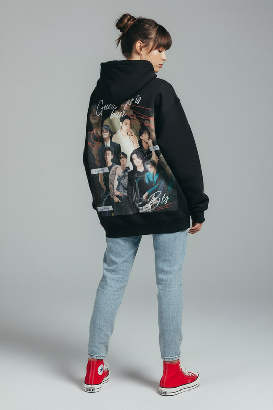 Black hoodie with a graphic design on the back featuring multiple people and text.