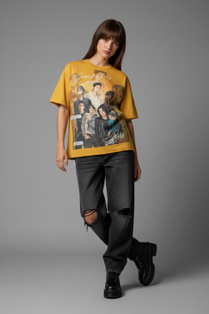 Yellow t-shirt with graphic design of a group of people on a white background