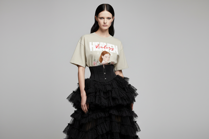 Beige t-shirt with a graphic of a person in armor with flowers and text on a white background