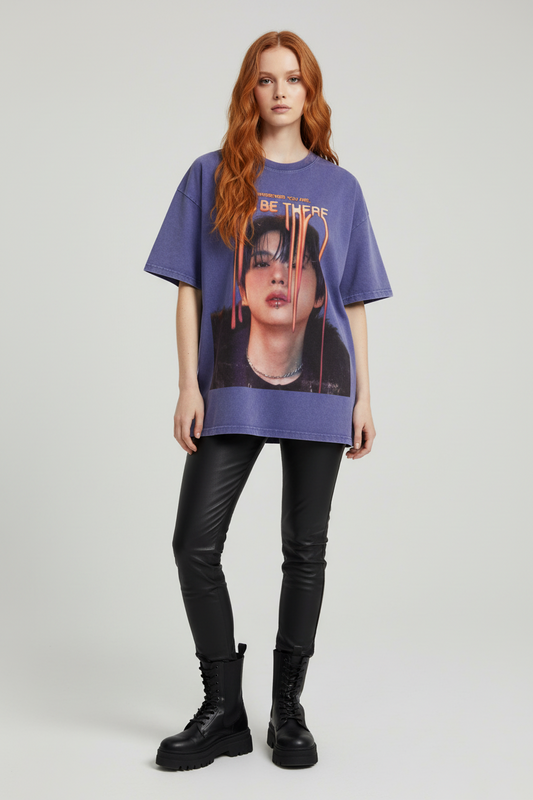 Blue t-shirt with bts jin graphic design and text on a white background