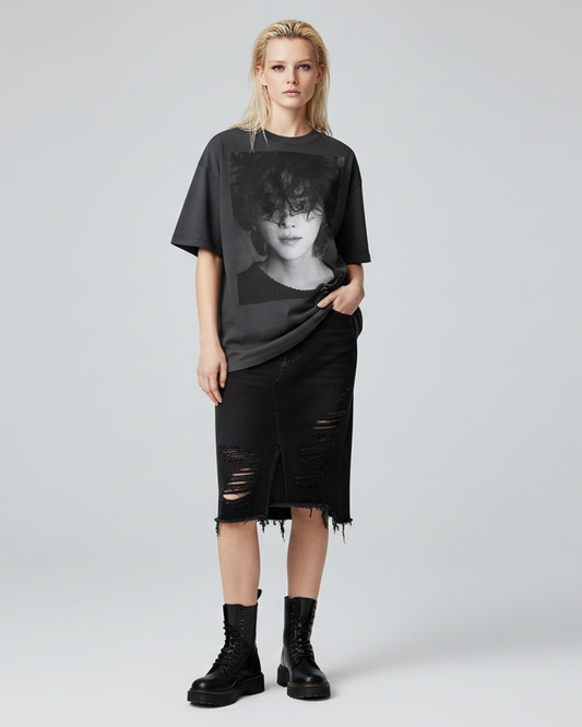 Black t-shirt with a graphic of a person with curly hair on a white background