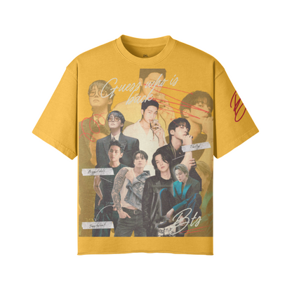 Yellow t-shirt with graphic design of a group of people on a white background