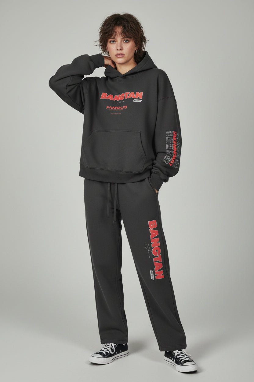 Black hoodie and pants set with red text on a light gray background