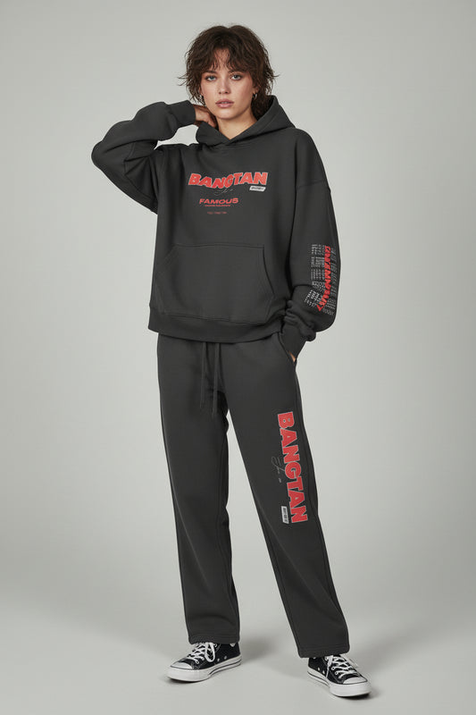 Black hoodie and pants set with red text on a light gray background