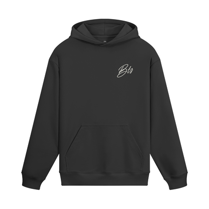 Black hoodie with a small logo on the chest against a white background