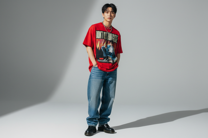 Red t-shirt with graphic design featuring a person and text on a white background