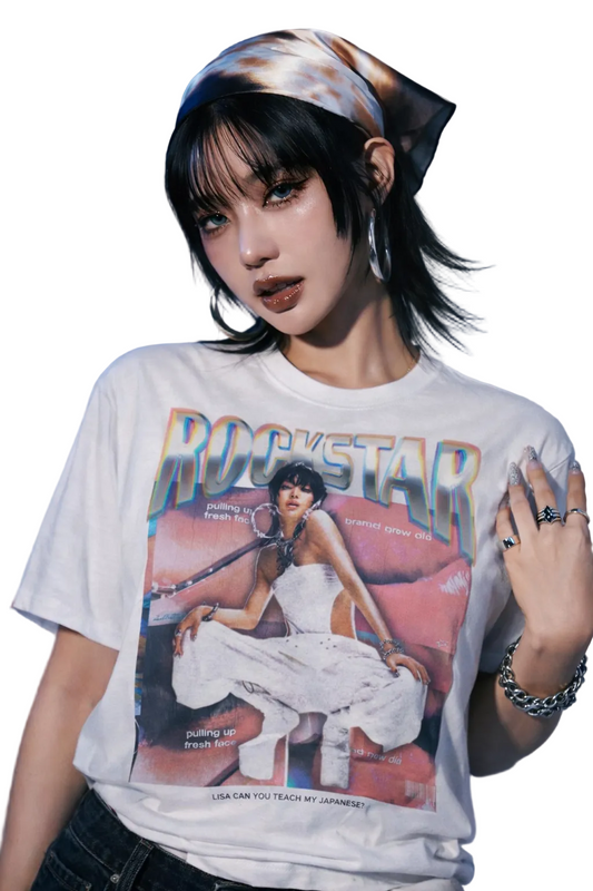 Person wearing a t-shirt with a graphic design of a woman and the text 'Rockstar'.