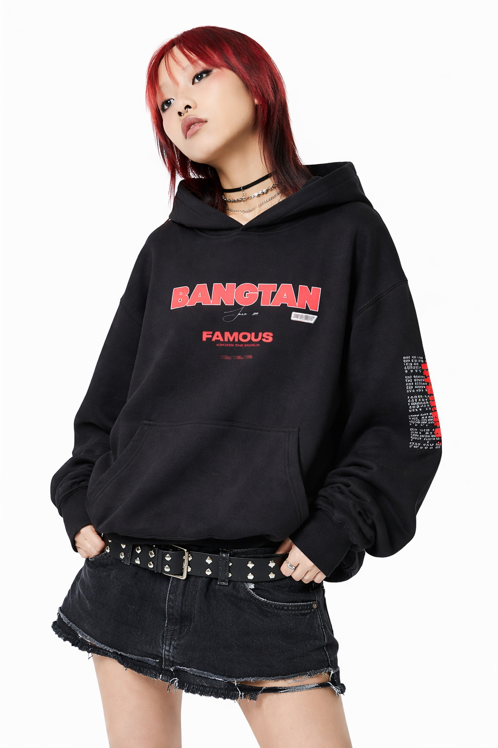 Person wearing a black hoodie with 'BANGTAN' text, standing against a white background