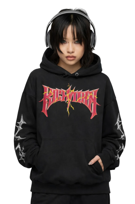 Person wearing a black hoodie with a red and yellow graphic design on a light gray background
