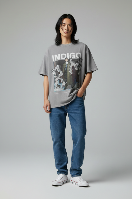 Gray t-shirt with graphic design and 'INDIGO' text on a white background