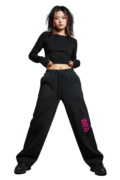 Black pants with pink text on a white background