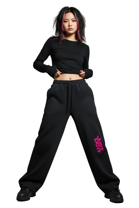 Black pants with pink text on a white background