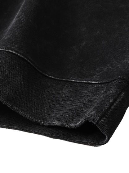 Close-up of black fabric with a subtle texture on a white background