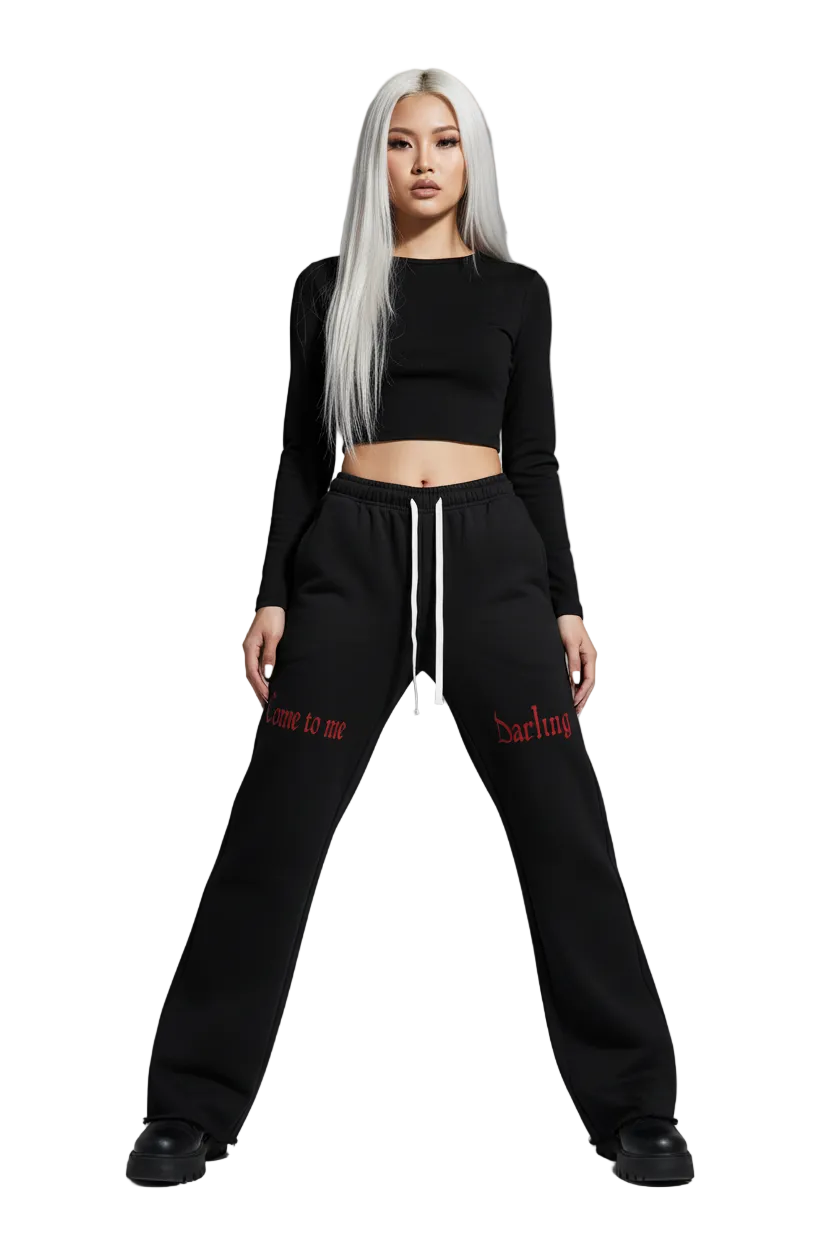 Black flared pants on a white background